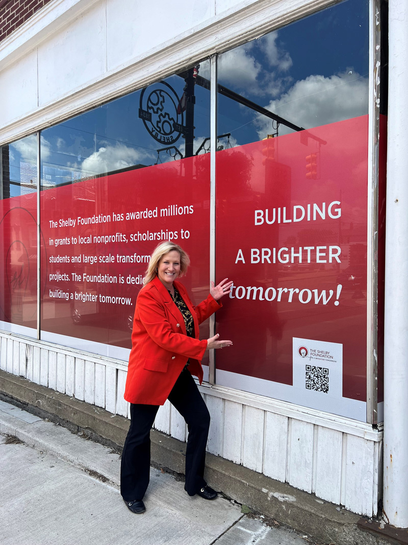 Building a Brighter Tomorrow decal on downtown building