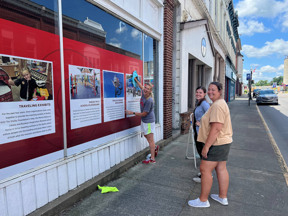 Decal installation on downtown buildings